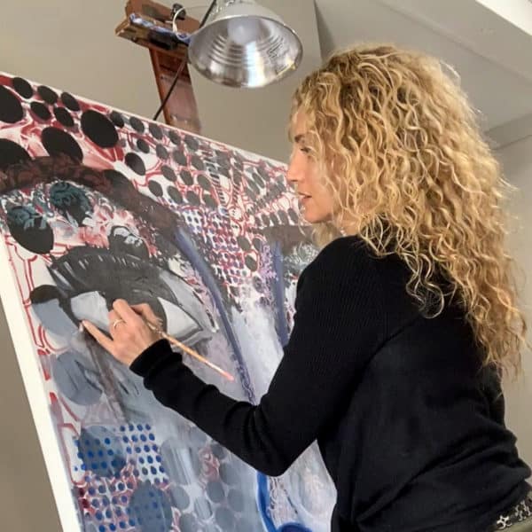 Ronit Galazan painting in her studio